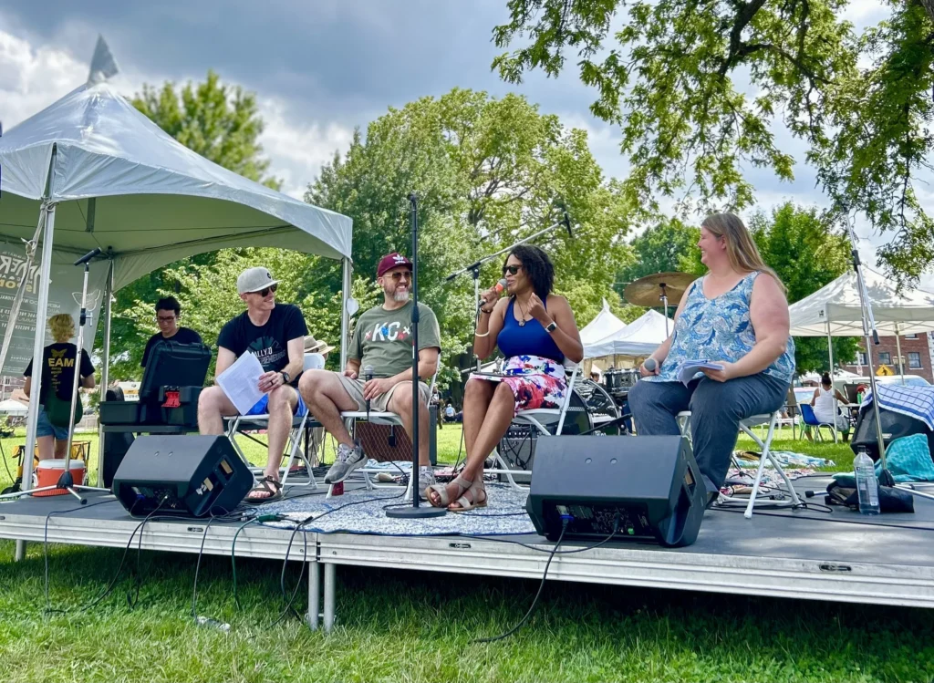Image shows a panel of two women and four men at the Kansas City Ameri'kana festival.